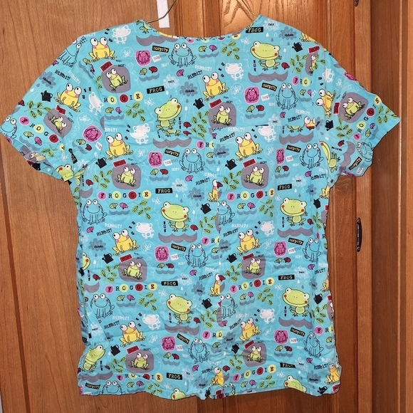 A set of ScrubStar scrubs in a medium. They feature a frog print all over. - Picture 5 of 5